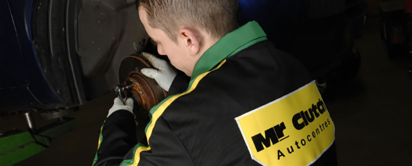 Mr Clutch mechanic replacing car brake